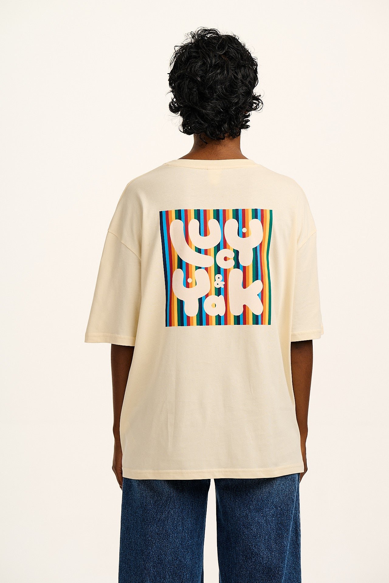 Benny - Organic Cotton Tee in Ecru with Logo Rainbow Stripe Print